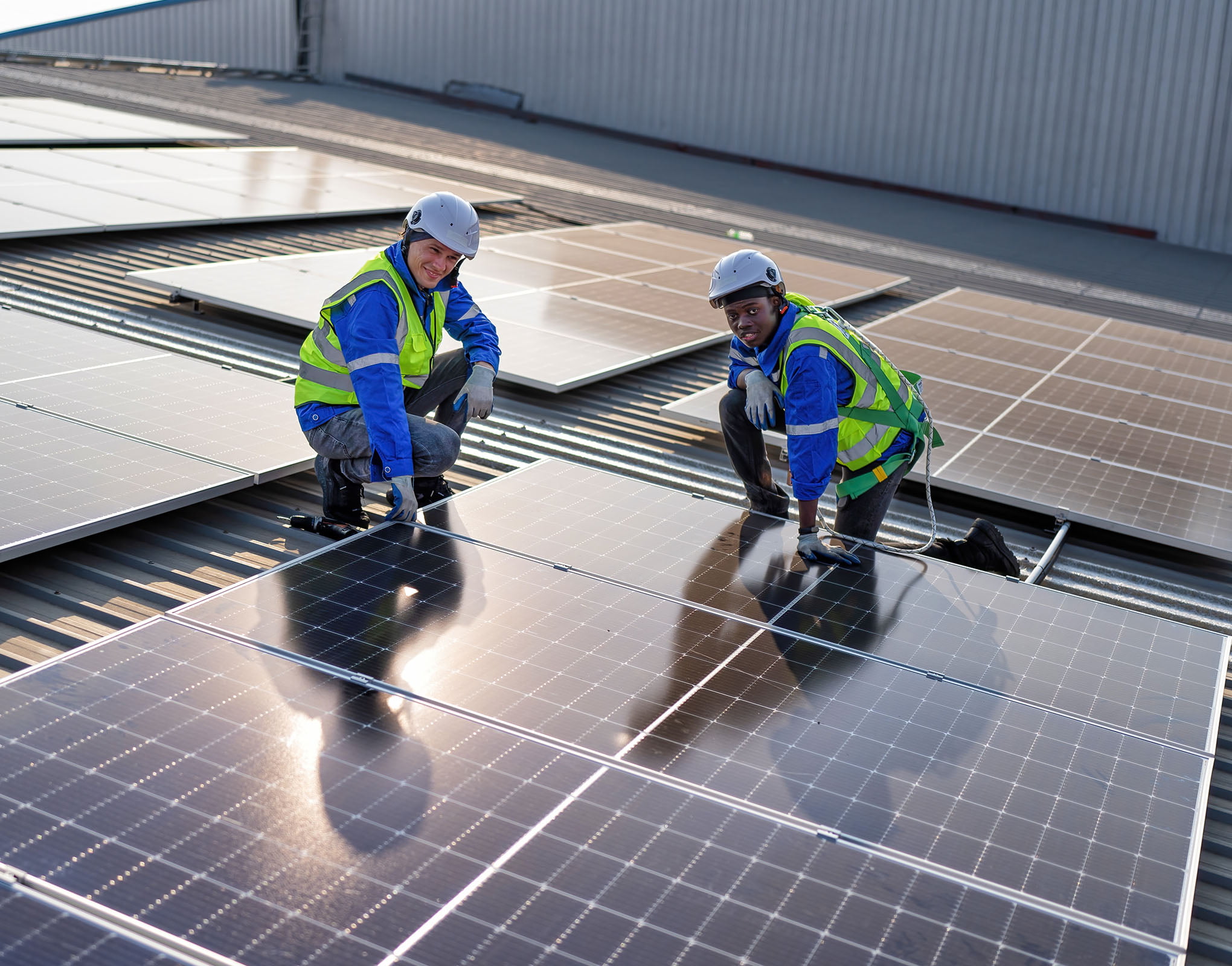 Staff Checking Solar Panels