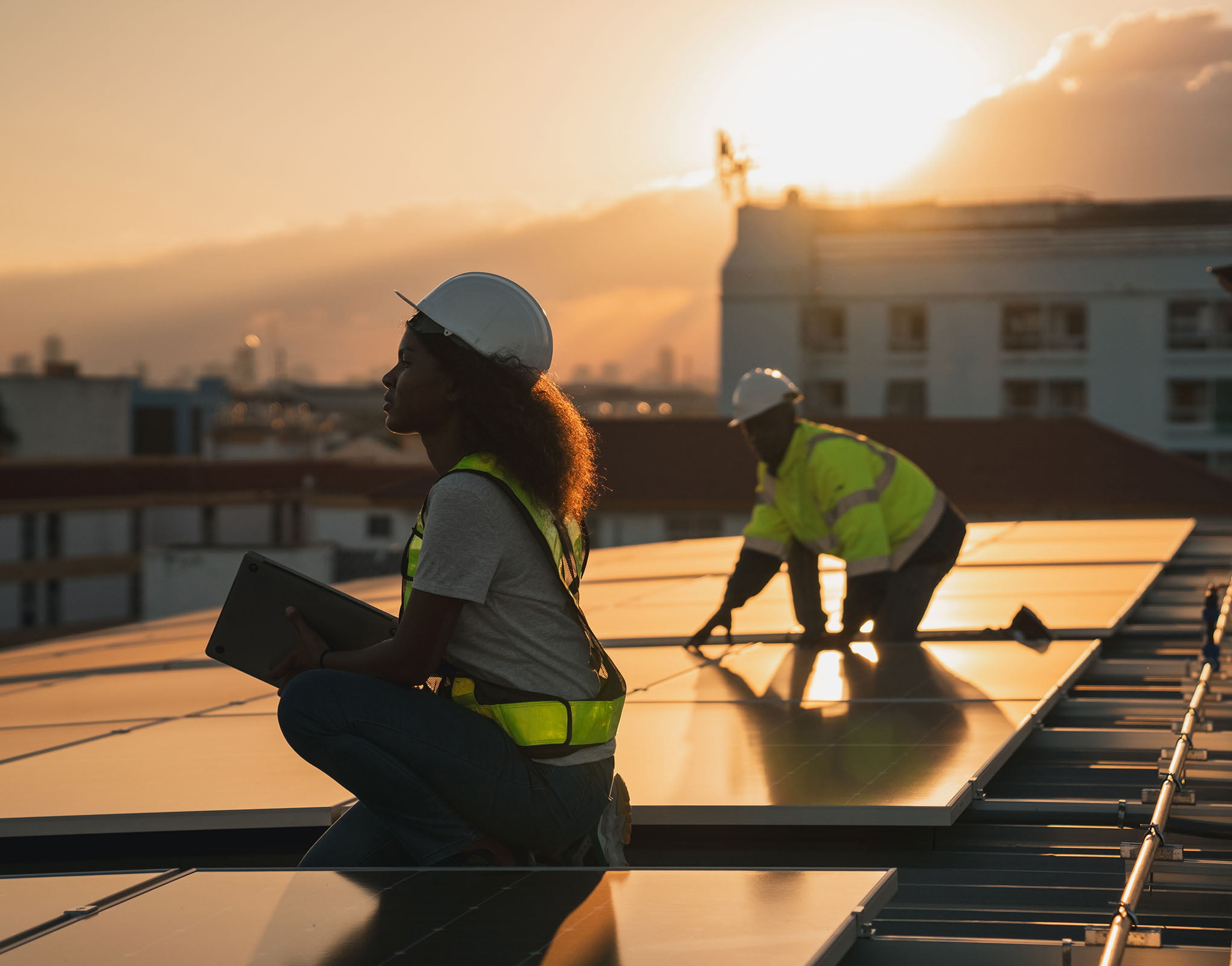 Engineers Fitting Solar Panels