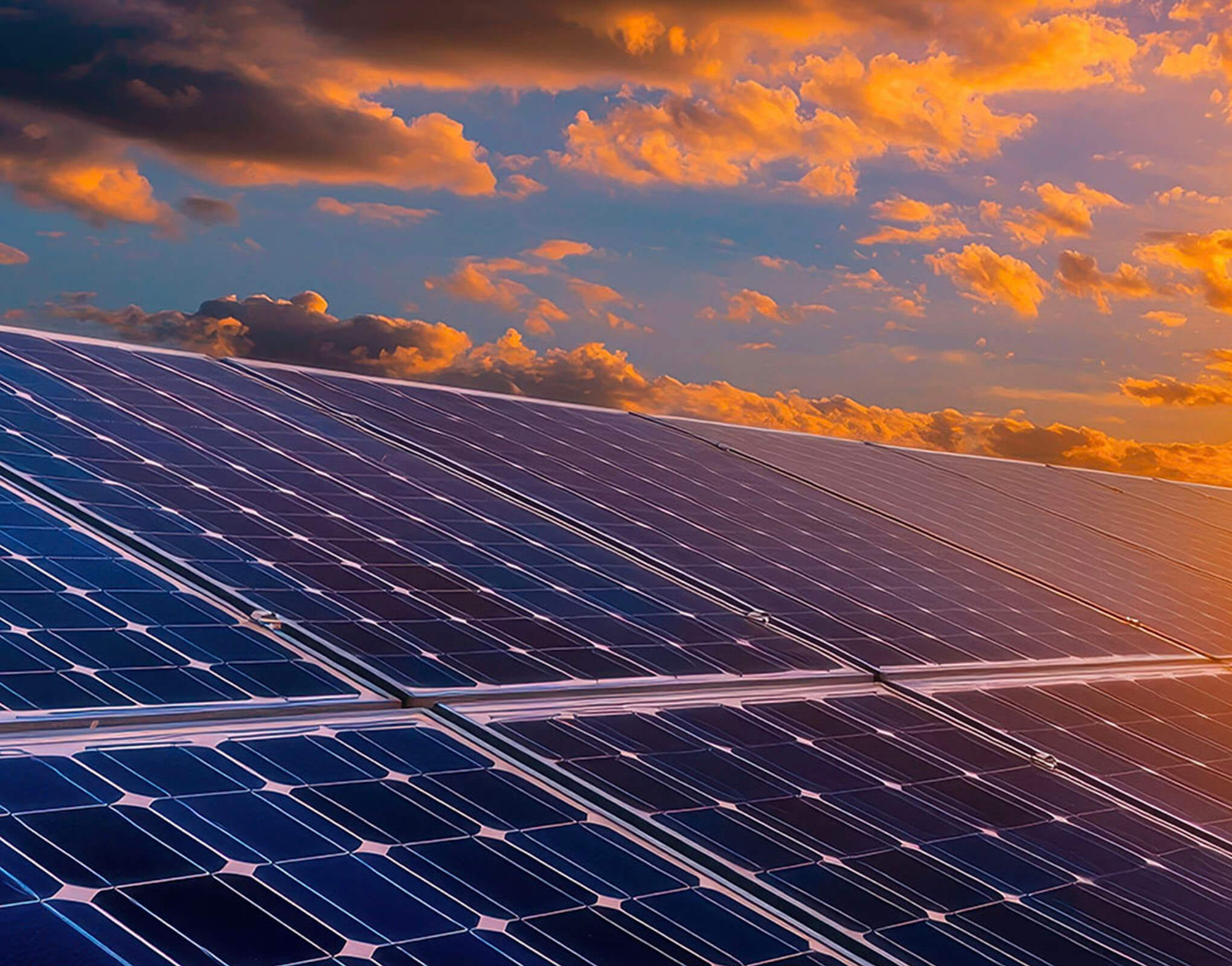 solar-panels-with-orange-sunset-background-resized Solar Panels with Orange Sunset Background Resized