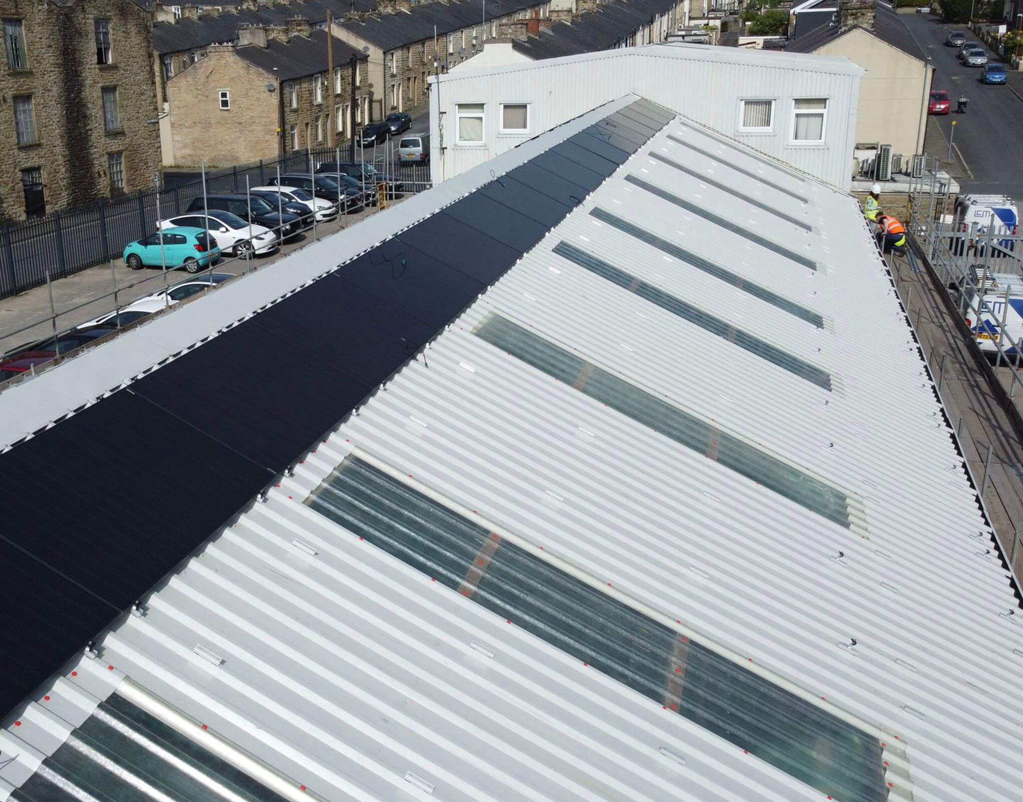 thin-strip-of-solar-panels-on-LCM-roof